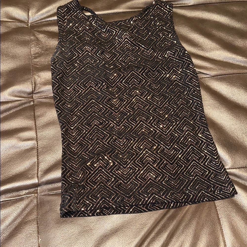 Shine in this crisscross detail back—size medium